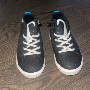 Native black boot with zipper. Size 8. Worn once